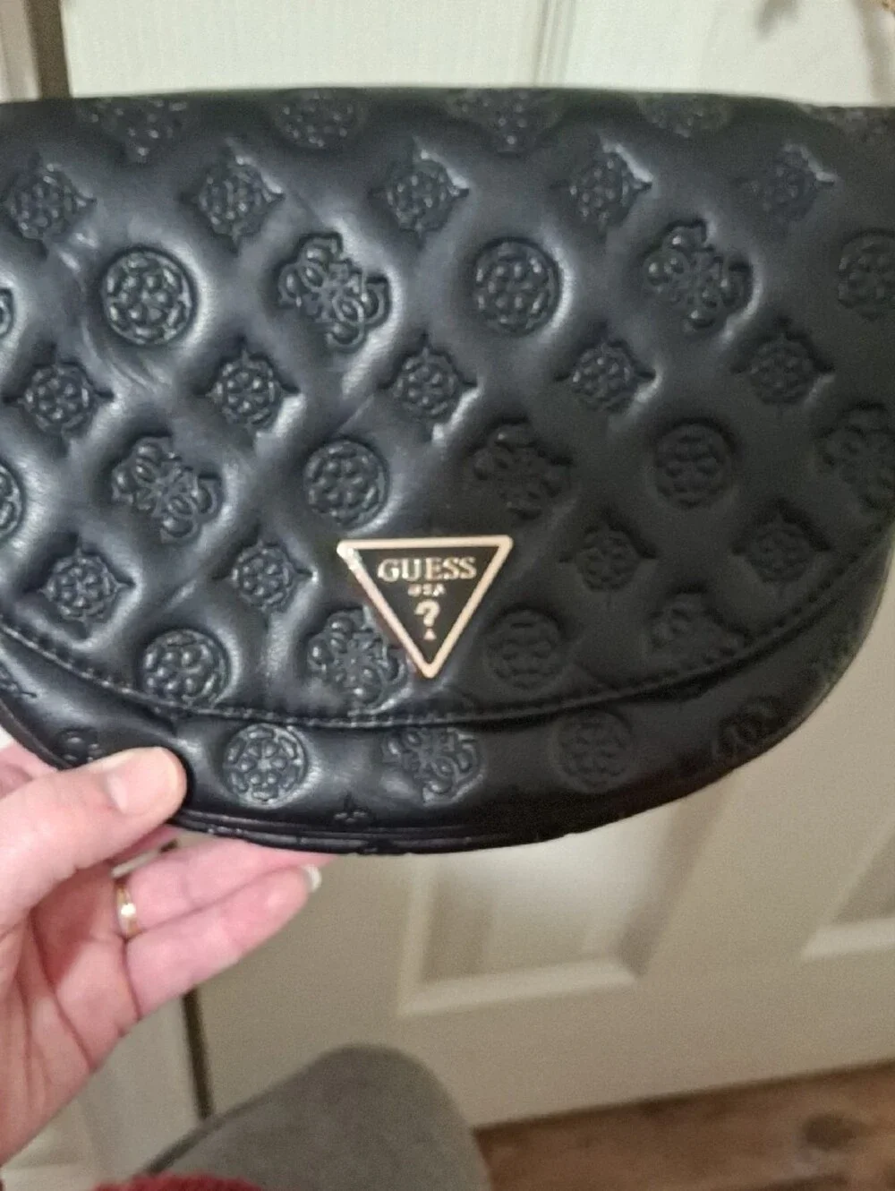GUESS Black Embossed Leather Shoulder Bag with Gold Chain and Charm Accent